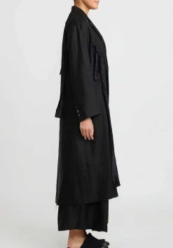 A Tentative Atelier Deconstructed Oversize Judit Twist Coat In Black
