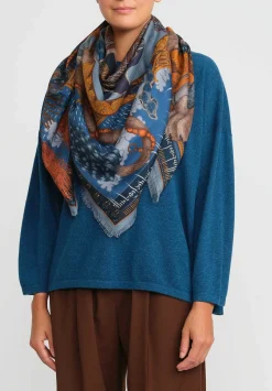 Sabina Savage Wool And Silk The Snow Lion Scarf In Ice Blue & Fire Orange
